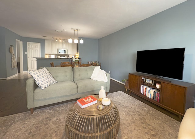 1919 Bailey St, Houston, TX 77006 - living room featuring baseboards
