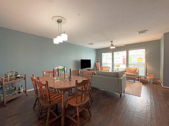 1919 Bailey St, Houston, TX 77006 - dining area with wood finished floors, baseboards, and a ceiling fan