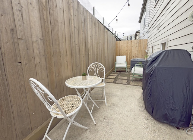 1919 Bailey St, Houston, TX 77006 - view of patio featuring central AC unit