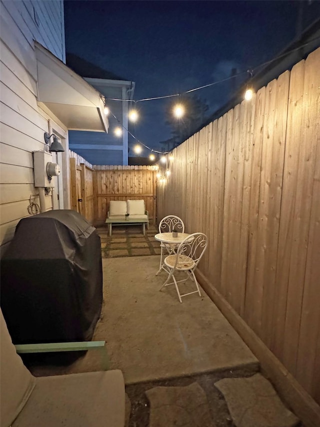 1919 Bailey St, Houston, TX 77006 - patio at night featuring a grill and a patio area