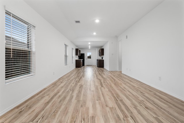 4331 Cedar Elm St, Baytown, TX 77521 - unfurnished living room featuring light wood-style floors, recessed lighting, and baseboards