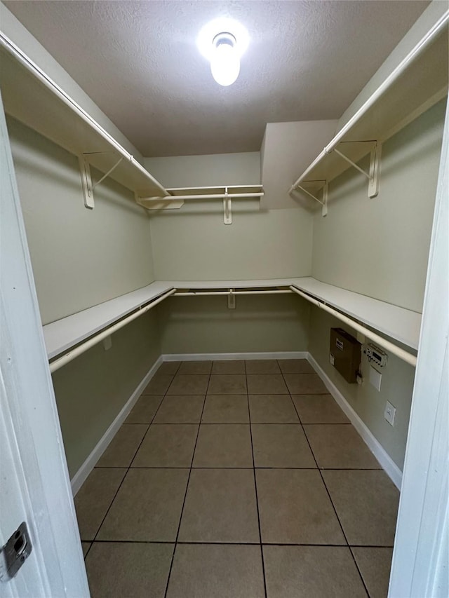 19119 Field Cottage Ln, Richmond, TX 77407 - spacious closet with tile patterned flooring