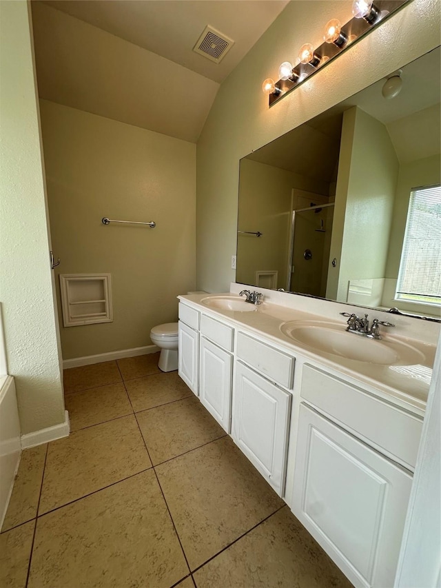 19119 Field Cottage Ln, Richmond, TX 77407 - full bath featuring lofted ceiling, double vanity, tile patterned floors, a stall shower, and toilet