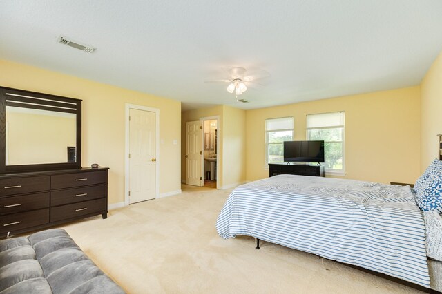208 Fawn Trl, Lake Jackson, TX 77566 - bedroom featuring light colored carpet, baseboards, and a ceiling fan