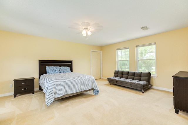 208 Fawn Trl, Lake Jackson, TX 77566 - bedroom featuring light carpet, baseboards, and a ceiling fan