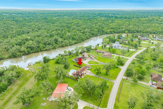 208 Fawn Trl, Lake Jackson, TX 77566 - aerial overview of property's location featuring a forest and a large body of water