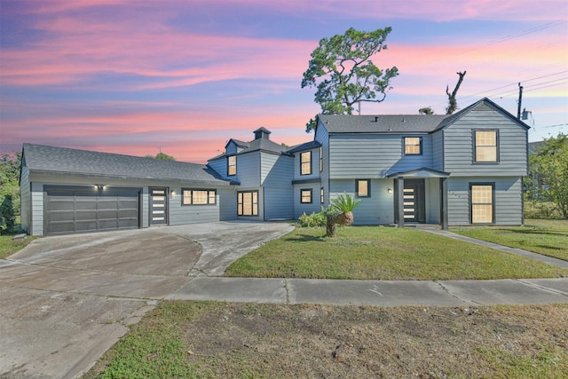 5419 Palmer St, Houston, TX 77004 - view of front facade with an attached garage, driveway, and a lawn