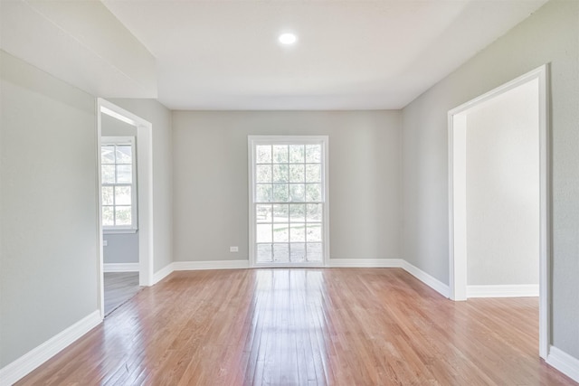 5419 Palmer St, Houston, TX 77004 - empty room featuring plenty of natural light, light wood-style floors, and baseboards