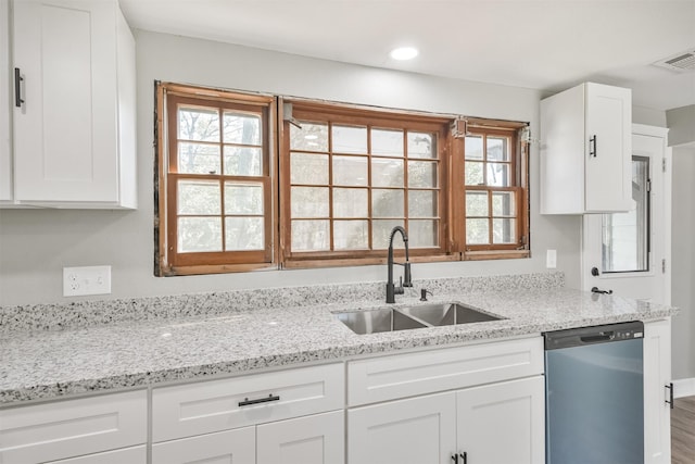 5419 Palmer St, Houston, TX 77004 - kitchen with dishwasher, a sink, white cabinetry, light stone counters, and recessed lighting