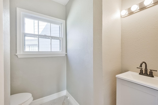 5419 Palmer St, Houston, TX 77004 - half bathroom with toilet, vanity, and baseboards