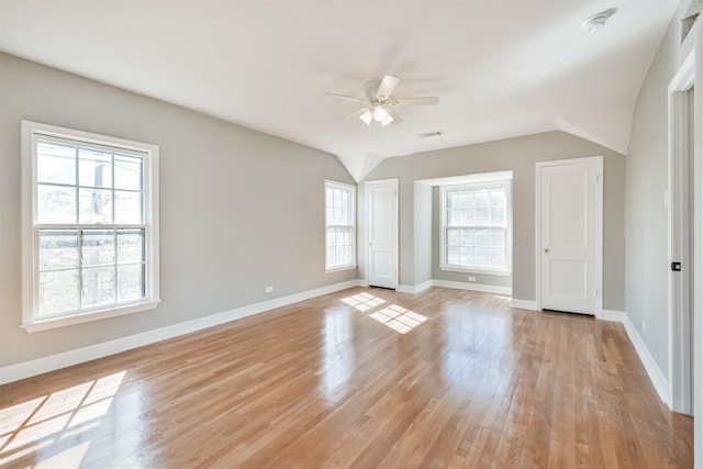 5419 Palmer St, Houston, TX 77004 - unfurnished bedroom with light wood-style flooring, baseboards, and a ceiling fan