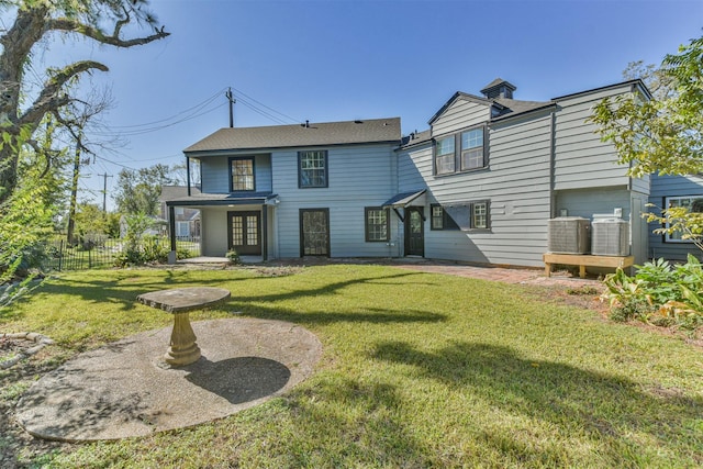 5419 Palmer St, Houston, TX 77004 - rear view of property featuring central air condition unit and a shingled roof