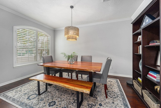 31215 Rainwood Park Ln, Spring, TX 77386 - dining space with ornamental molding, dark wood finished floors, baseboards, and a textured ceiling