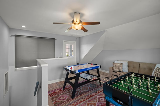 3582 County Road 476, Palacios, TX 77465 - rec room with a ceiling fan, wood finished floors, and recessed lighting
