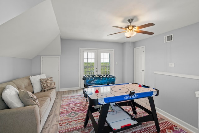 3582 County Road 476, Palacios, TX 77465 - game room with wood finished floors, ceiling fan, and baseboards