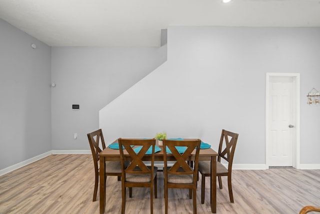 3582 County Road 476, Palacios, TX 77465 - dining room with light wood-style floors, baseboards, and recessed lighting