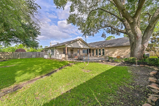 406 Westwood Dr, Friendswood, TX 77546 - back of house featuring a patio area