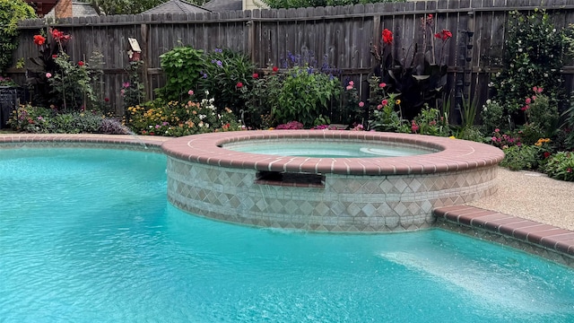 16022 Winchmore Hill Dr, Spring, TX 77379 - view of pool featuring a pool with connected hot tub