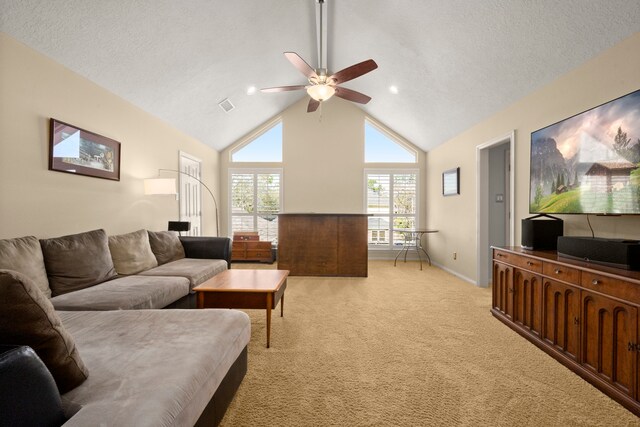 16022 Winchmore Hill Dr, Spring, TX 77379 - living room with ceiling fan, light colored carpet, high vaulted ceiling, baseboards, and recessed lighting
