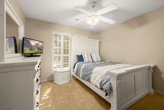 16022 Winchmore Hill Dr, Spring, TX 77379 - bedroom featuring light colored carpet, baseboards, and ceiling fan