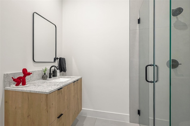 1550 Ashway St, Conroe, TX 77385 - full bathroom with a shower stall, tile patterned flooring, and vanity