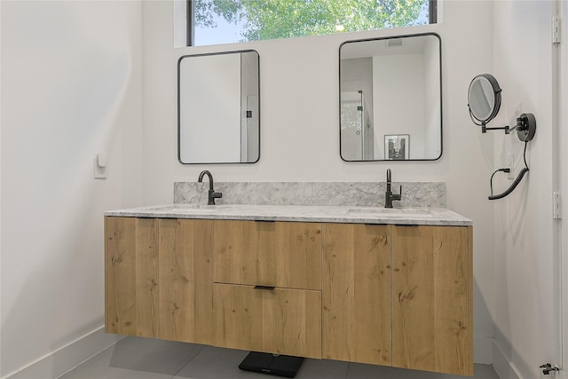 1550 Ashway St, Conroe, TX 77385 - bathroom featuring double vanity and healthy amount of natural light