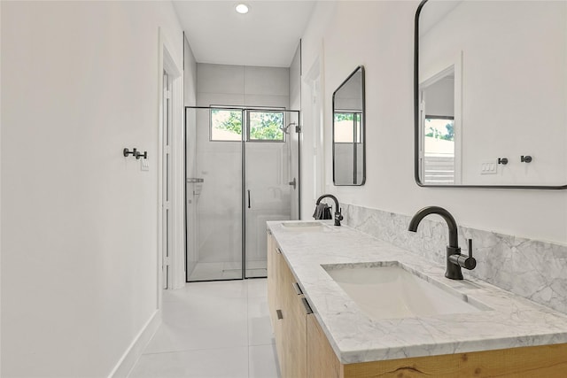 1550 Ashway St, Conroe, TX 77385 - bathroom featuring tile patterned flooring, double vanity, a shower stall, and recessed lighting