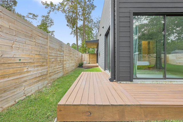 1550 Ashway St, Conroe, TX 77385 - wooden deck with a fenced backyard