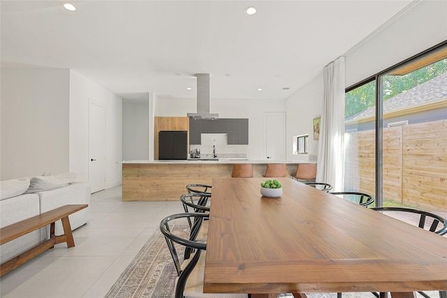 1550 Ashway St, Conroe, TX 77385 - dining area with recessed lighting and light tile patterned floors