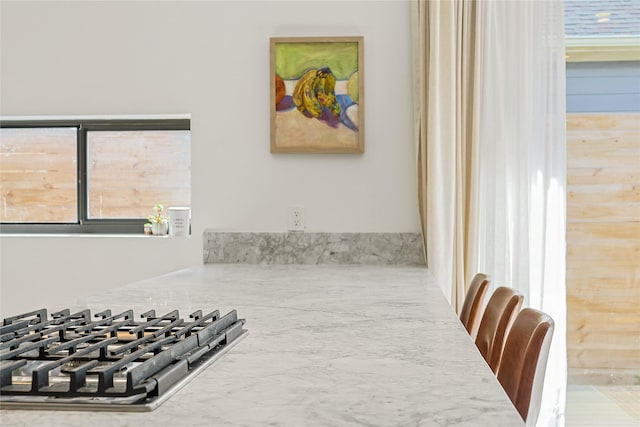 1550 Ashway St, Conroe, TX 77385 - kitchen view of stainless steel gas cooktop and light countertops