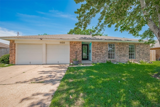 8411 Misty Vale Ln, Houston, TX 77075 - view of front facade featuring concrete driveway, a garage, brick siding, and a front lawn