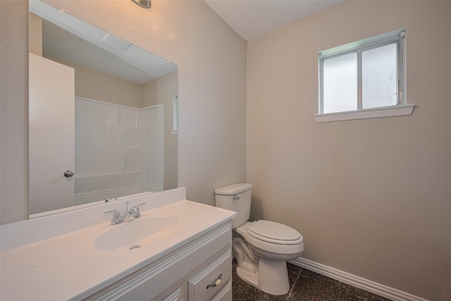 8411 Misty Vale Ln, Houston, TX 77075 - bathroom featuring baseboards, vanity, and toilet