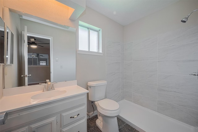 8411 Misty Vale Ln, Houston, TX 77075 - full bath with ceiling fan, vanity, toilet, and tiled shower