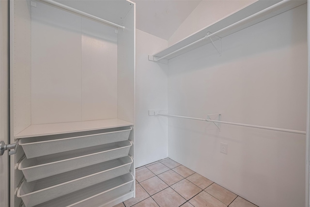 8411 Misty Vale Ln, Houston, TX 77075 - walk in closet with light tile patterned floors