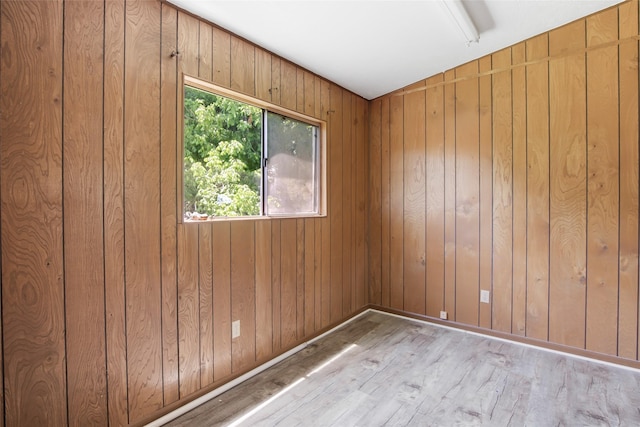606 N Main St, Dayton, TX 77535 - unfurnished room with wood finished floors and wooden walls