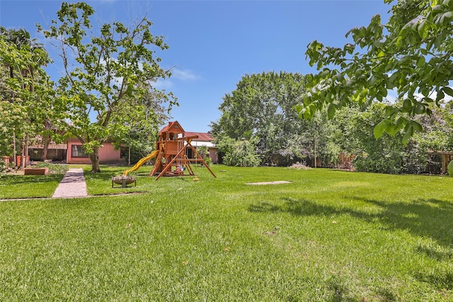 606 N Main St, Dayton, TX 77535 - view of yard with a playground
