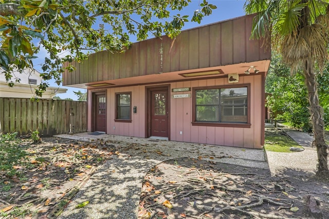 606 N Main St, Dayton, TX 77535 - view of front of property featuring board and batten siding