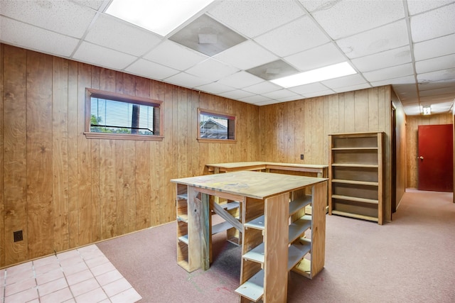 606 N Main St, Dayton, TX 77535 - carpeted dining room with wood walls and a paneled ceiling