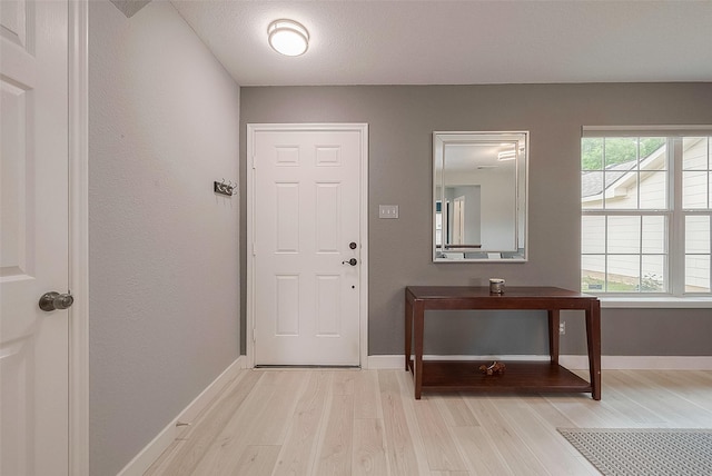 15251 Weeping Cedar Ln, Houston, TX 77084 - entrance foyer with light wood finished floors and baseboards