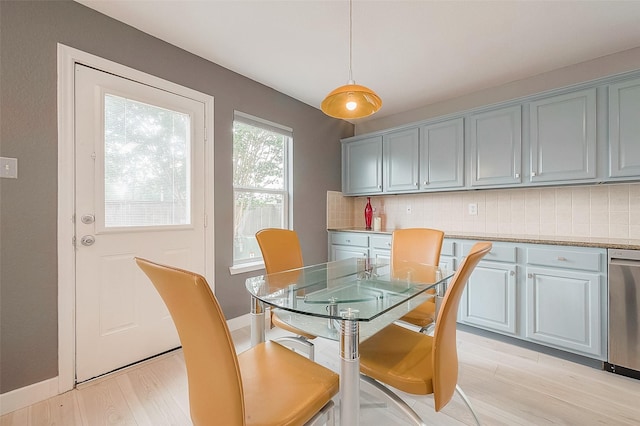 15251 Weeping Cedar Ln, Houston, TX 77084 - dining room featuring light wood-style flooring and baseboards