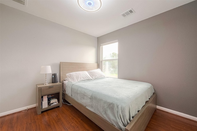 15251 Weeping Cedar Ln, Houston, TX 77084 - bedroom featuring baseboards and wood finished floors