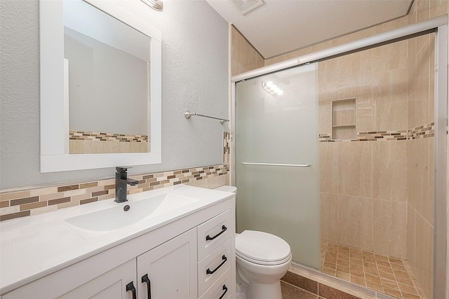 15251 Weeping Cedar Ln, Houston, TX 77084 - bathroom featuring vanity, toilet, a shower stall, tasteful backsplash, and tile patterned flooring