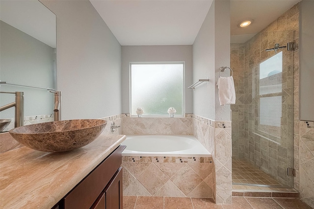 15251 Weeping Cedar Ln, Houston, TX 77084 - bathroom with a bath, a shower stall, vanity, and recessed lighting