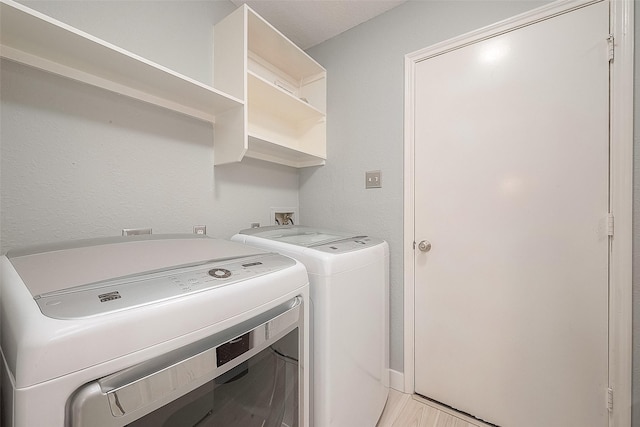 15251 Weeping Cedar Ln, Houston, TX 77084 - washroom with washing machine and dryer
