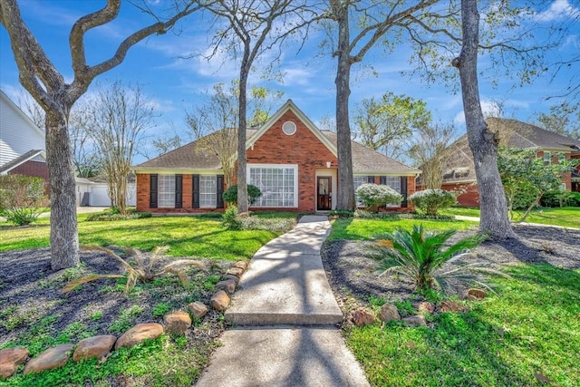 15510 Park Estates Ln, Houston, TX 77062 - view of front of property featuring brick siding and a front lawn