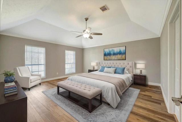 15510 Park Estates Ln, Houston, TX 77062 - bedroom with light wood-style flooring, vaulted ceiling, baseboards, ornamental molding, and a ceiling fan