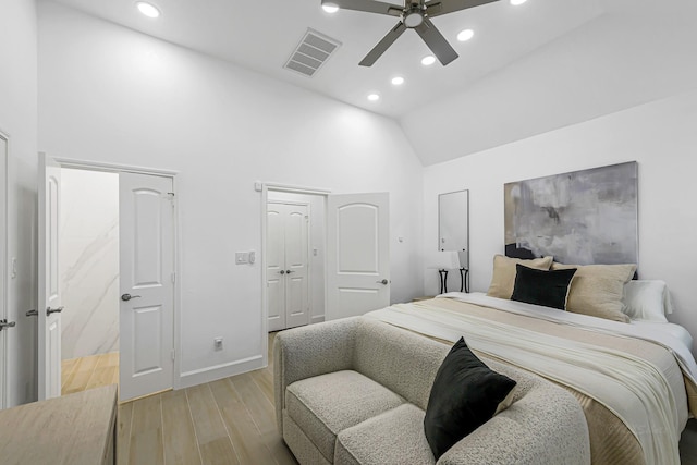24203 Leonforte Dr, Richmond, TX 77406 - bedroom featuring recessed lighting, light wood-style flooring, baseboards, high vaulted ceiling, and ceiling fan