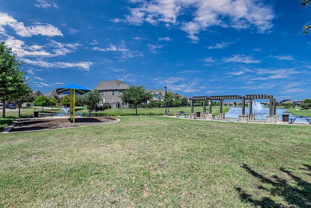 24203 Leonforte Dr, Richmond, TX 77406 - view of green lawn with a pergola and a water view