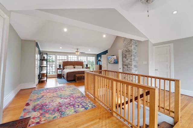 3222 Oakmont St, Houston, TX 77021 - hall with lofted ceiling, an upstairs landing, light wood finished floors, recessed lighting, and baseboards