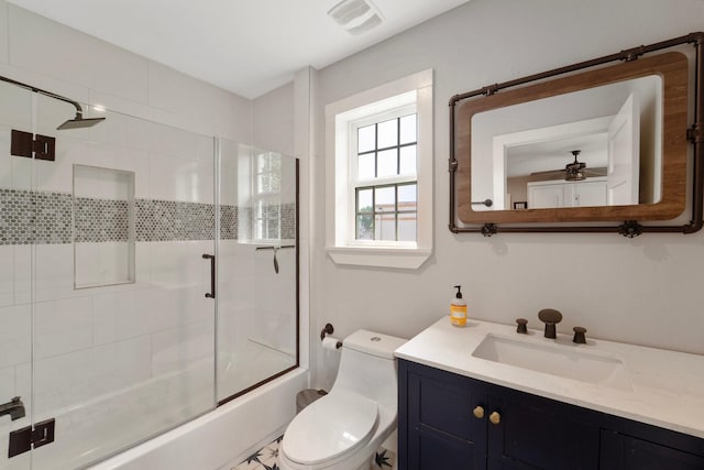 3222 Oakmont St, Houston, TX 77021 - full bath featuring toilet, vanity, shower / bath combination with glass door, and ceiling fan